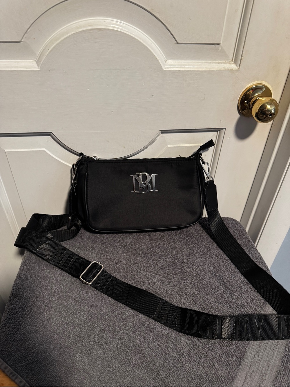 Badgley Mischka Black Crossbody with Silver Logo and Adjustable Logo Strap